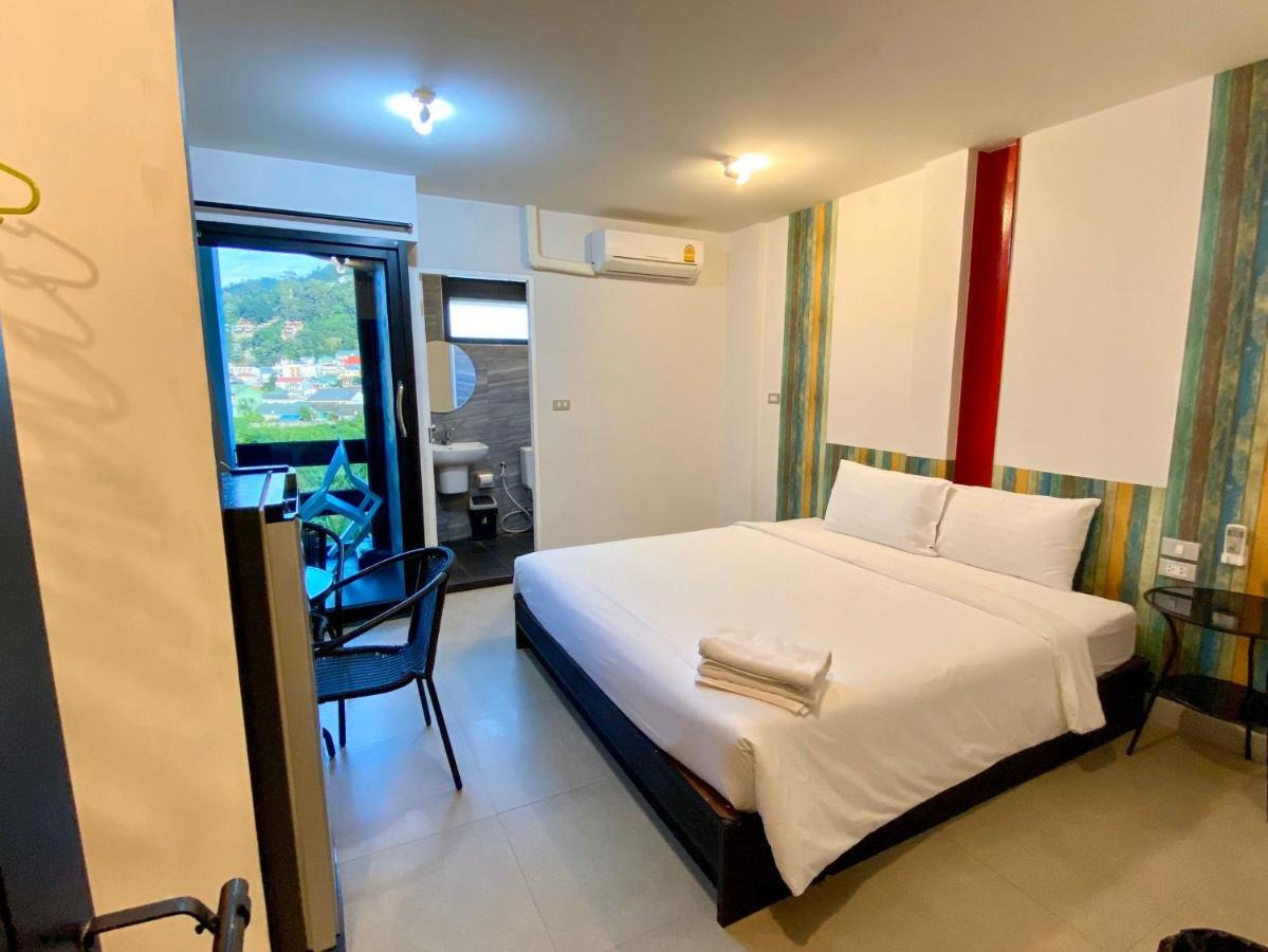 Beam House Hotel Patong Bagian luar foto